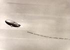 Beginning in 1940, it wasn't unusual for a blimp to tow a banner or talk!  Banner-towing Goodyear blimps would occasionally advertise commercial offerings such as soft drinks.