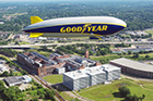 The Goodyear Tire & Rubber Company's blimp, Wingfoot One, in flight over the company's Akron headquarters.