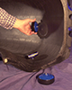 The sensor portion of The Goodyear Tire & Rubber Company's intelligent tire system consists of a 3-diameter, 1.3-thick, lightweight intelligent tire sensor, about the size of a hockey puck, that is fastened to the tire innerliner, where it measures cavity temperature and pressure and transmits data every three minutes. An in-cab receiver, which can be programmed with each tire's identification and the truck number, logs data. It sends the data upstream to the mine management system unit in the cab. Goodyear's system is the industry's first commercially available intelligent tire system that will help operators control tire costs and significantly lower downtime due to tire issues.