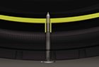 A diagram shows how The Goodyear Tire & Rubber Company's DuraSeal technology sealant fills in around a nail in the tread area.  This self-sealing feature allows truck drivers to continue driving and virtually eliminate expensive downtime.  Repairs to the tire can be delayed until the tire is removed for retreading.