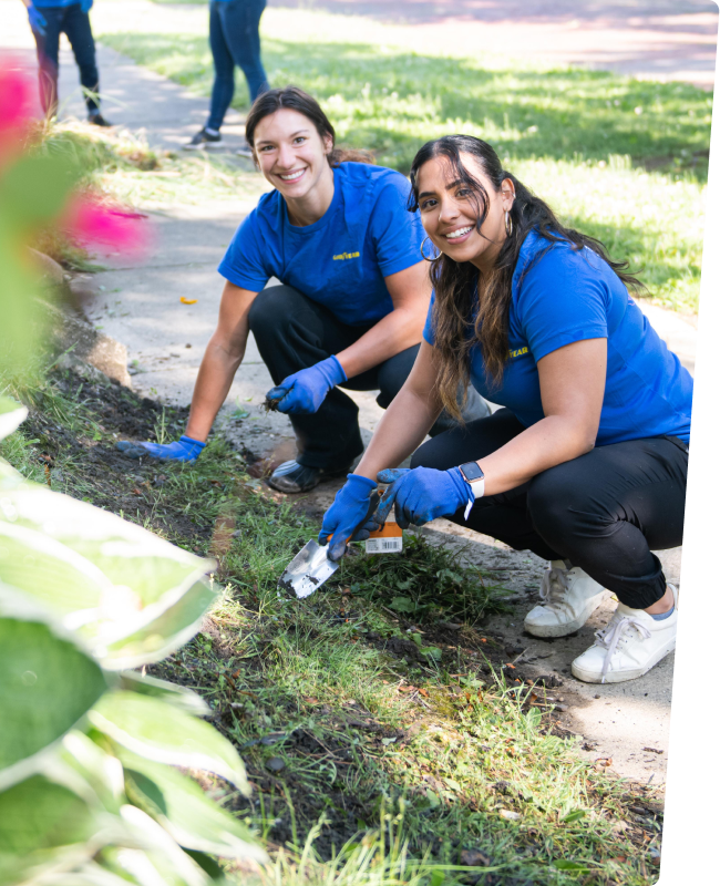 Two Goodyear associates volunteering for Goodyear's Global Week of Volunteering gardening